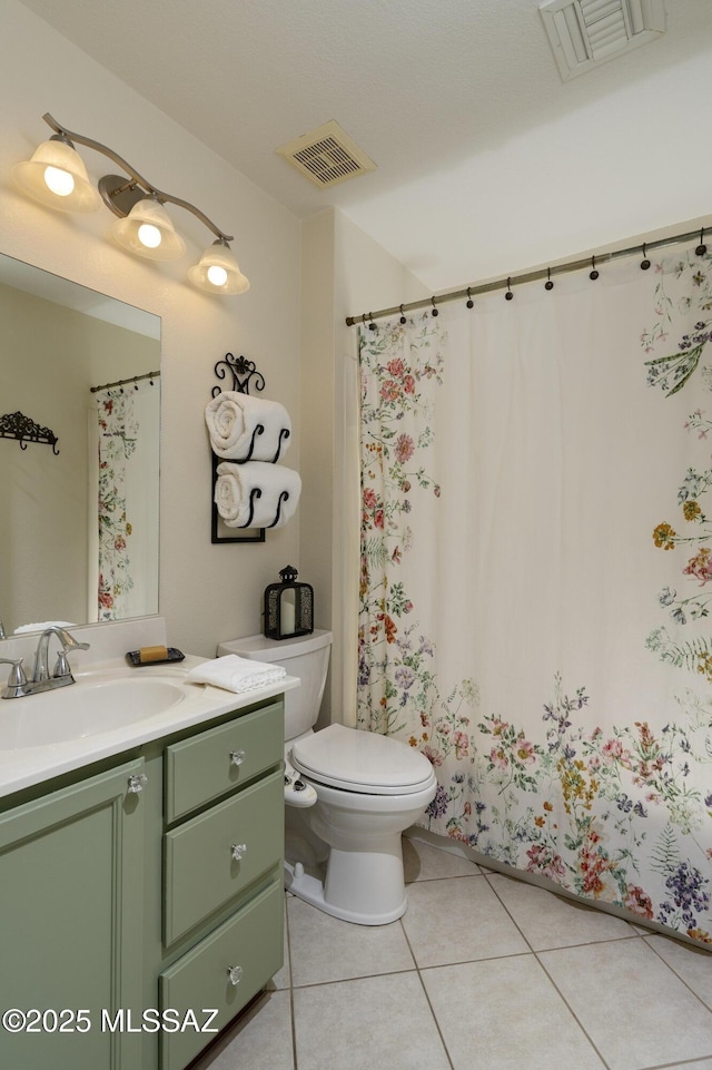 2246 E Amaranth St, Oro Valley, AZ 85755 - full bath with tile patterned floors, vanity, and toilet