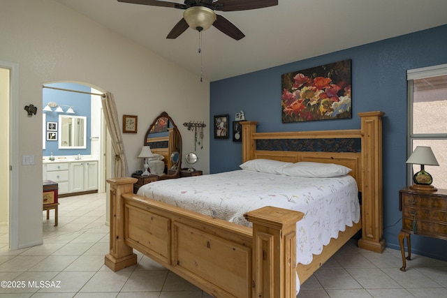 2246 E Amaranth St, Oro Valley, AZ 85755 - bedroom with light tile patterned flooring, lofted ceiling, connected bathroom, and ceiling fan