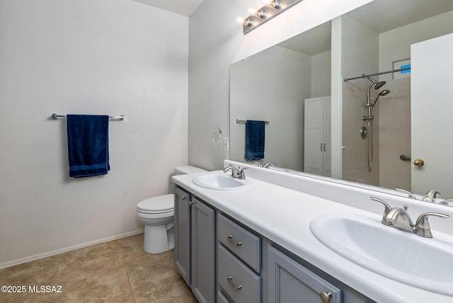 7746 S Trumpet Vine Ave, Tucson, AZ 85747 - full bathroom featuring toilet, baseboards, double vanity, and a shower