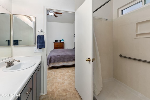 7746 S Trumpet Vine Ave, Tucson, AZ 85747 - bathroom with ceiling fan, vanity, curtained shower, ensuite bathroom, and tile patterned floors