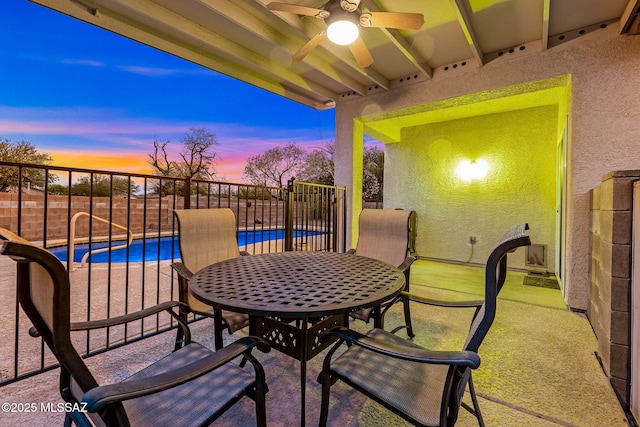 7746 S Trumpet Vine Ave, Tucson, AZ 85747 - view of patio featuring a ceiling fan, a fenced backyard, and outdoor dining space