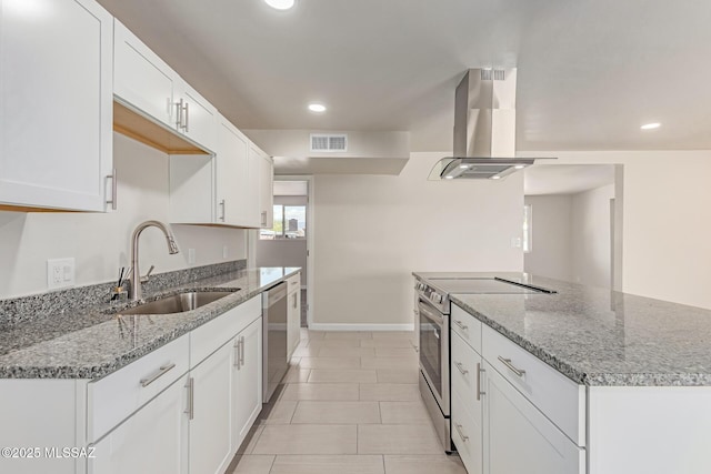 7932 E Winnepeg Dr, Tucson, AZ 85730 - kitchen featuring appliances with stainless steel finishes, a sink, island range hood, baseboards, and recessed lighting