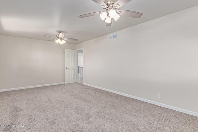 7932 E Winnepeg Dr, Tucson, AZ 85730 - empty room featuring ceiling fan, carpet, and baseboards