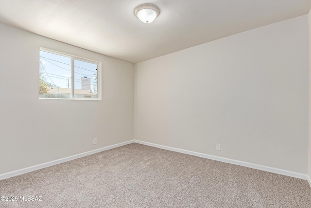 7932 E Winnepeg Dr, Tucson, AZ 85730 - unfurnished room with carpet and baseboards