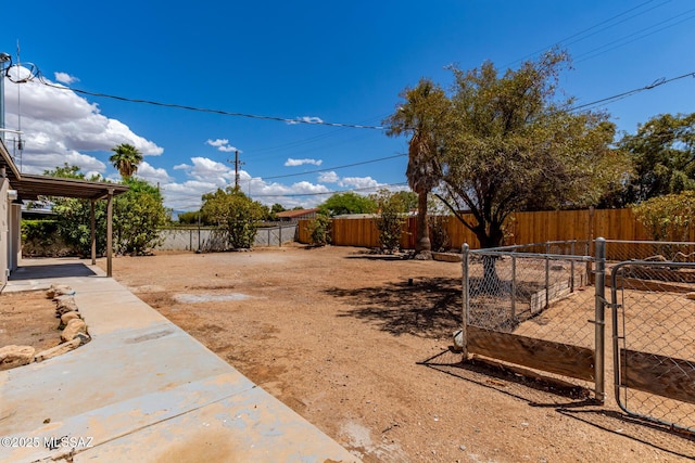 7932 E Winnepeg Dr, Tucson, AZ 85730 - fenced backyard with a gate