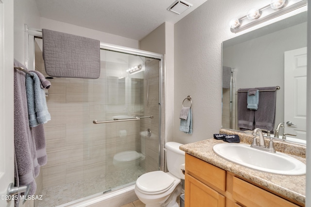 5855 N Kolb Rd Unit 1102, Tucson, AZ 85750 - bathroom with toilet, vanity, and a stall shower