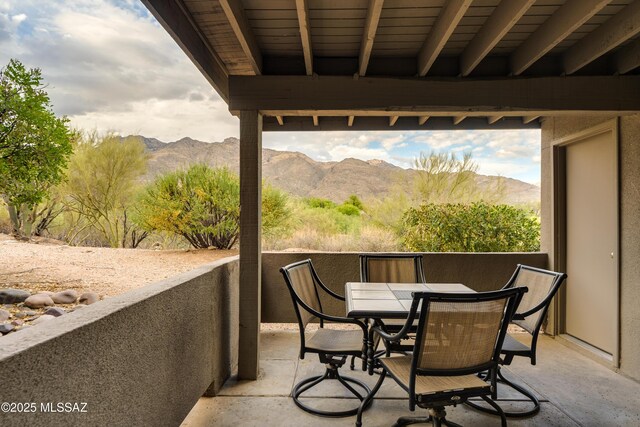 5855 N Kolb Rd Unit 1102, Tucson, AZ 85750 - balcony featuring a mountain view, a patio, and outdoor dining area