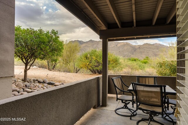 5855 N Kolb Rd Unit 1102, Tucson, AZ 85750 - balcony with a mountain view and outdoor dining area