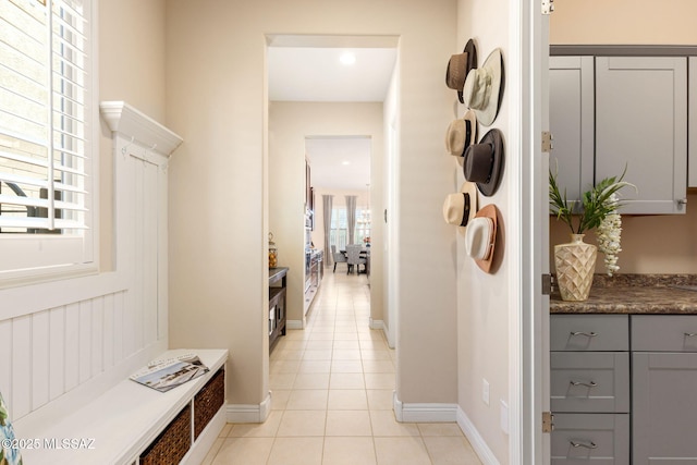 6719 W Kaibab Trl, Marana, AZ 85658 - hallway featuring light tile patterned floors and baseboards