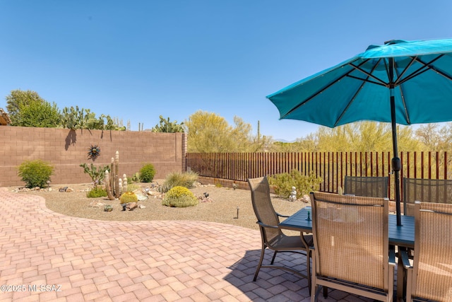 6719 W Kaibab Trl, Marana, AZ 85658 - fenced backyard featuring outdoor dining area and a patio area