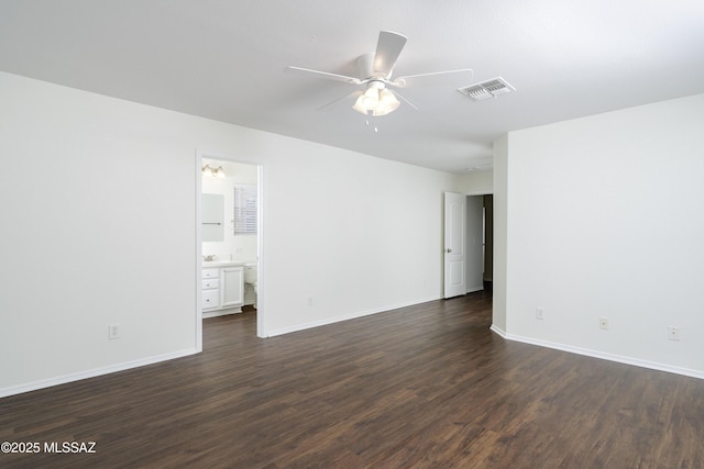 6775 S Aquiline Dr, Tucson, AZ 85756 - unfurnished room with dark wood finished floors and ceiling fan
