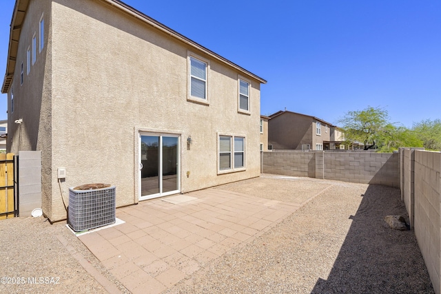 6775 S Aquiline Dr, Tucson, AZ 85756 - back of house with stucco siding, a patio, and a fenced backyard