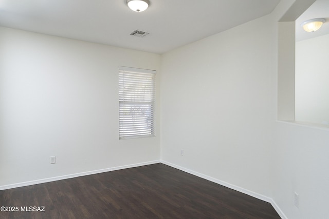 6775 S Aquiline Dr, Tucson, AZ 85756 - unfurnished room featuring dark wood-style flooring