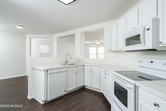 6775 S Aquiline Dr, Tucson, AZ 85756 - kitchen featuring white appliances, dark wood-style flooring, and white cabinetry
