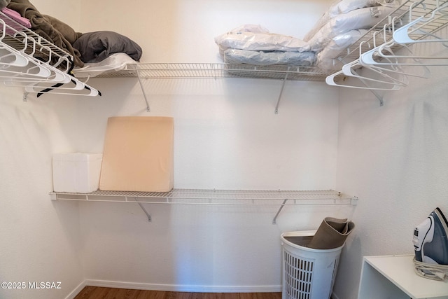 7050 E Sunrise Dr Unit 12106, Tucson, AZ 85750 - spacious closet featuring wood finished floors