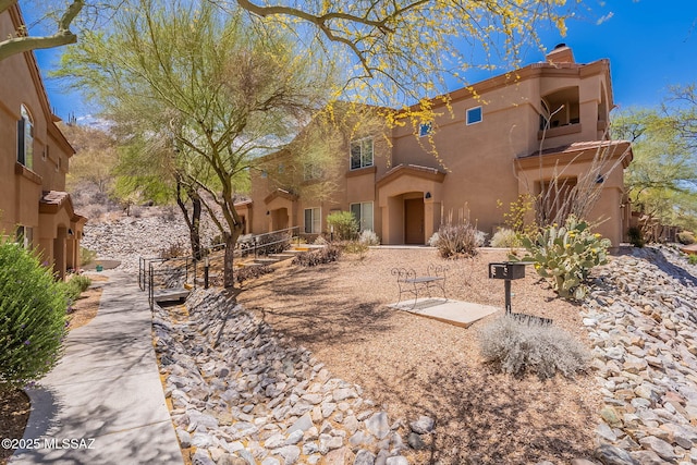7050 E Sunrise Dr Unit 12106, Tucson, AZ 85750 - view of front of property with a chimney