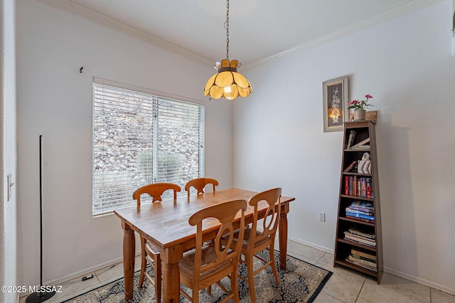 7050 E Sunrise Dr Unit 12106, Tucson, AZ 85750 - dining area with ornamental molding, baseboards, and light tile patterned floors