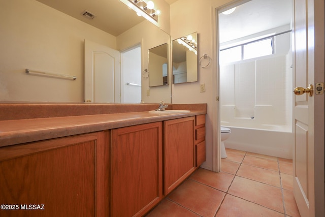 5426 N Willow Thicket Way, Tucson, AZ 85704 - full bathroom featuring toilet, tile patterned flooring, vanity, and shower / washtub combination