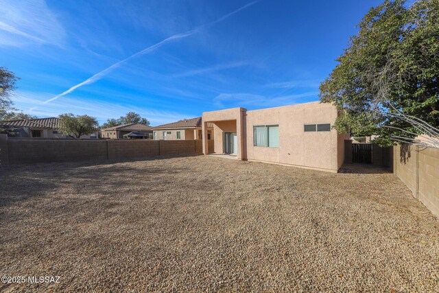5426 N Willow Thicket Way, Tucson, AZ 85704 - back of property featuring stucco siding and a fenced backyard
