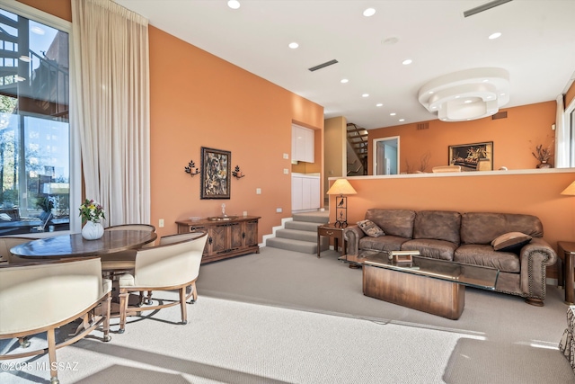 6461 N Thimble Pass, Tucson, AZ 85750 - living room with carpet floors, recessed lighting, and stairway