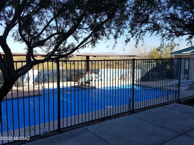 3025 N Gaia Pl, Tucson, AZ 85745 - gate featuring fence, a patio, and a mountain view