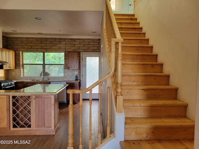 3025 N Gaia Pl, Tucson, AZ 85745 - stairs featuring wood-type flooring