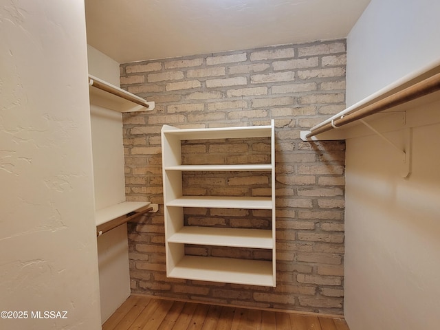 3025 N Gaia Pl, Tucson, AZ 85745 - spacious closet featuring wood-type flooring