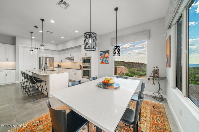 10465 E Ocotillo Rim Trl, Vail, AZ 85641 - dining area with baseboards and recessed lighting