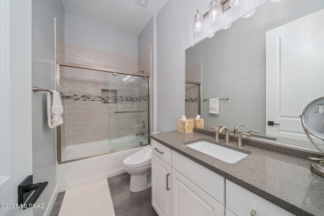 10465 E Ocotillo Rim Trl, Vail, AZ 85641 - full bath with toilet, bath / shower combo with glass door, vanity, and tile patterned flooring