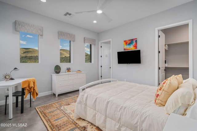10465 E Ocotillo Rim Trl, Vail, AZ 85641 - bedroom with recessed lighting, baseboards, a ceiling fan, and a walk in closet