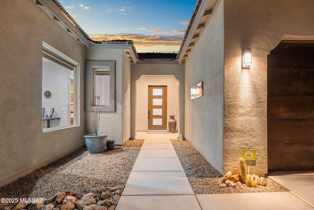10465 E Ocotillo Rim Trl, Vail, AZ 85641 - exterior entry at dusk with stucco siding