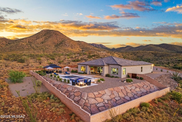 10465 E Ocotillo Rim Trl, Vail, AZ 85641 - outdoor pool featuring a gazebo, a patio area, a mountain view, and a fenced backyard