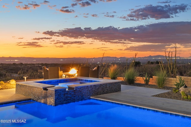 10465 E Ocotillo Rim Trl, Vail, AZ 85641 - view of pool with a mountain view, a pool with connected hot tub, and a patio area