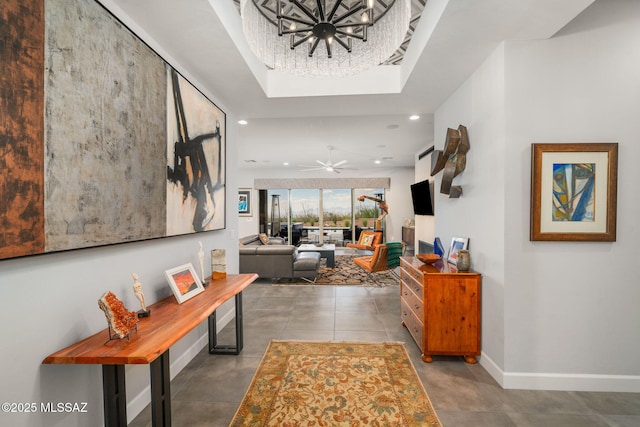 10465 E Ocotillo Rim Trl, Vail, AZ 85641 - corridor with baseboards, recessed lighting, concrete flooring, and a chandelier