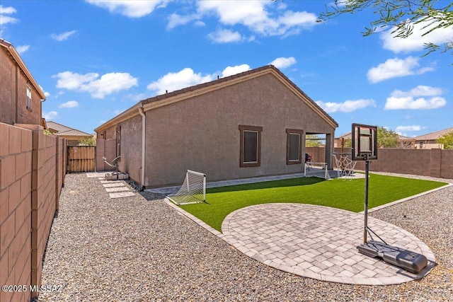 10094 N Cardon Grande Trl, Marana, AZ 85653 - rear view of property with stucco siding and a patio area