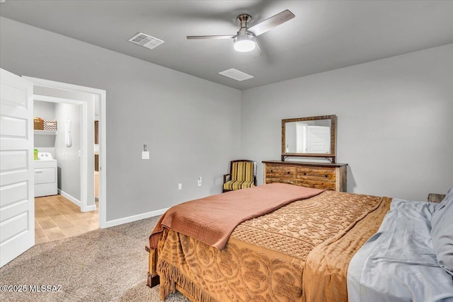 10094 N Cardon Grande Trl, Marana, AZ 85653 - bedroom featuring washer / dryer, light colored carpet, baseboards, and ceiling fan