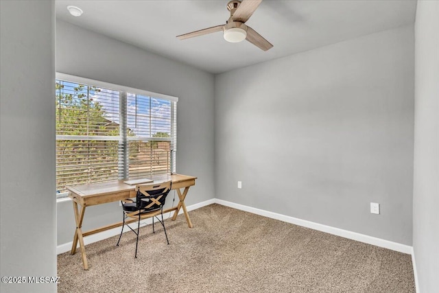 10094 N Cardon Grande Trl, Marana, AZ 85653 - office area with light colored carpet, a ceiling fan, and baseboards