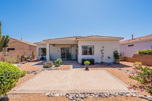2337 S Via Vespucci, Green Valley, AZ 85614 - back of house featuring a patio, stucco siding, and a fenced backyard