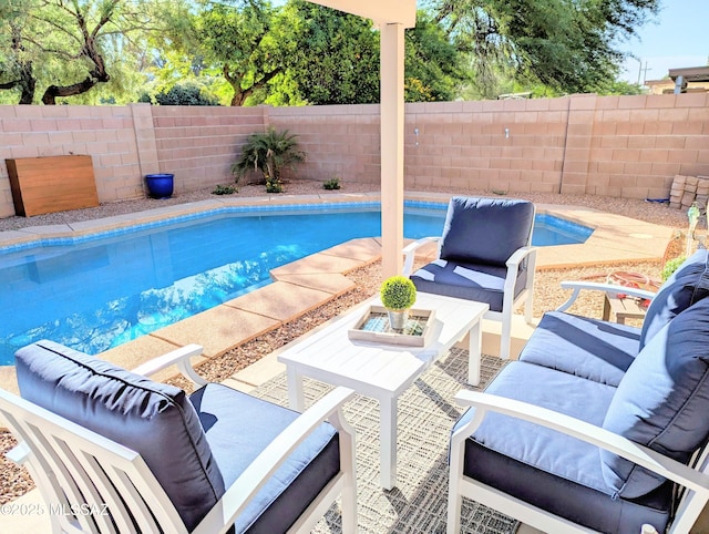 2866 W Medallion Dr, Tucson, AZ 85741 - view of pool featuring an outdoor living space and a fenced backyard