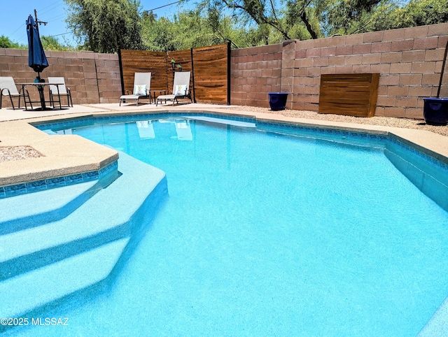 2866 W Medallion Dr, Tucson, AZ 85741 - view of pool with fence and a patio