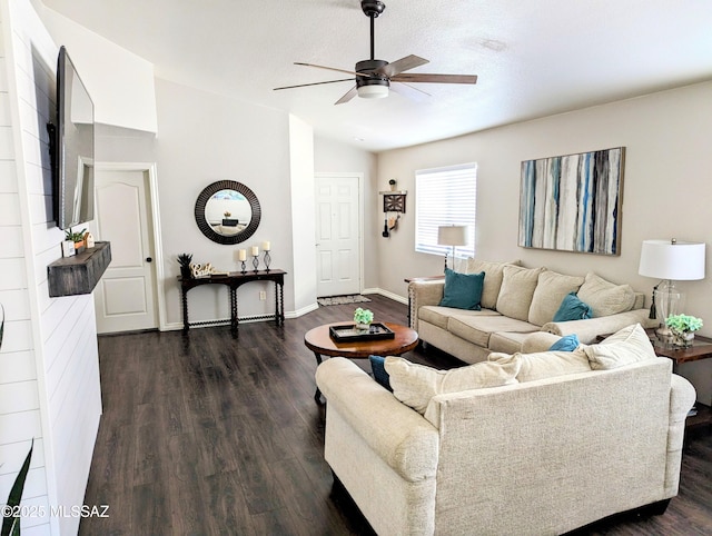 2866 W Medallion Dr, Tucson, AZ 85741 - living area featuring a ceiling fan, dark wood-style flooring, baseboards, and vaulted ceiling