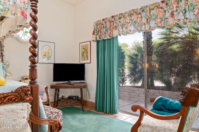 sitting room featuring tile patterned flooring
