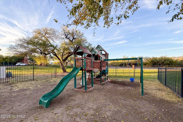community playground featuring fence