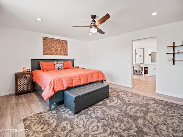 5825 N Camino Miraval Dr, Tucson, AZ 85718 - bedroom featuring wood finished floors, recessed lighting, baseboards, and ceiling fan
