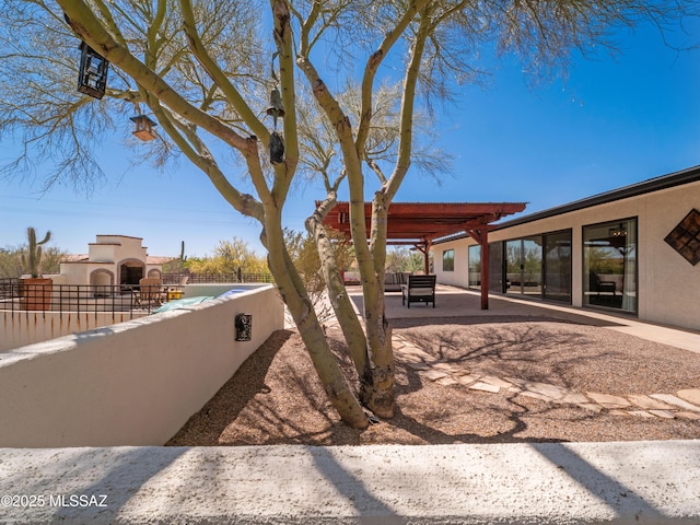 5825 N Camino Miraval Dr, Tucson, AZ 85718 - view of side of home featuring fence, stucco siding, and a patio area