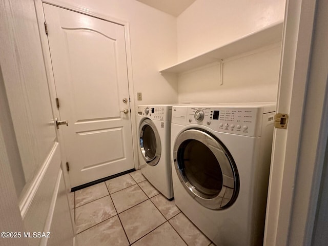 1989 N Camino Agrios, Tucson, AZ 85715 - laundry room featuring washing machine and dryer and light tile patterned flooring