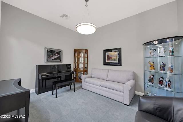 66450 E Sundance Pl, Saddlebrooke, AZ 85739 - carpeted living room featuring baseboards
