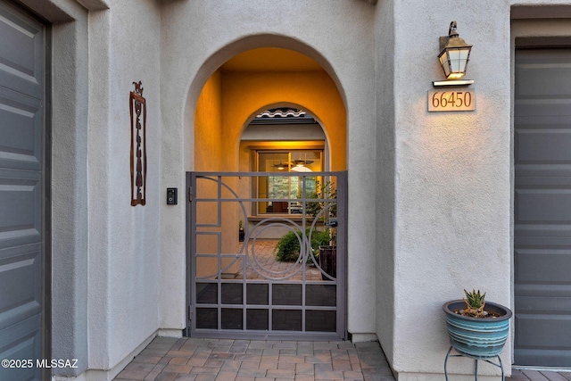 66450 E Sundance Pl, Saddlebrooke, AZ 85739 - view of exterior entry with stucco siding
