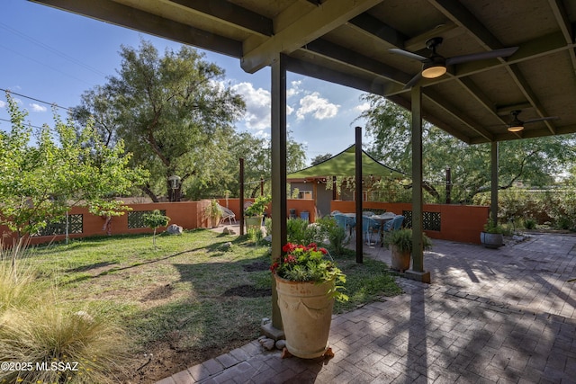 6714 E Topke St, Tucson, AZ 85715 - view of patio featuring a ceiling fan