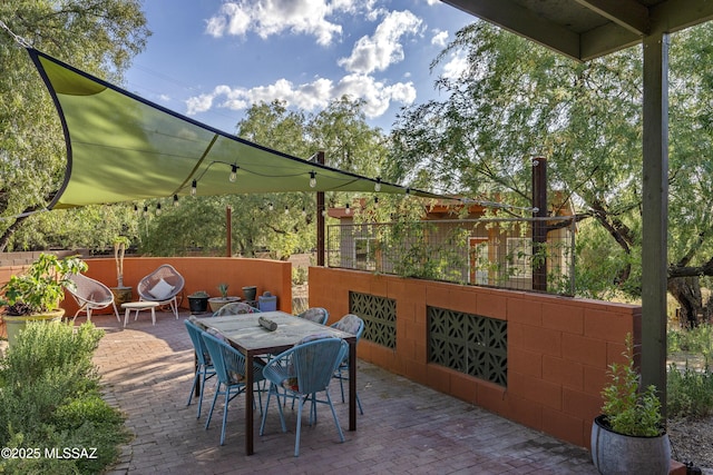 6714 E Topke St, Tucson, AZ 85715 - view of patio / terrace featuring outdoor dining space and fence